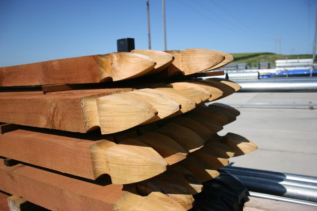 Cedar wood fence posts with french gothic tops