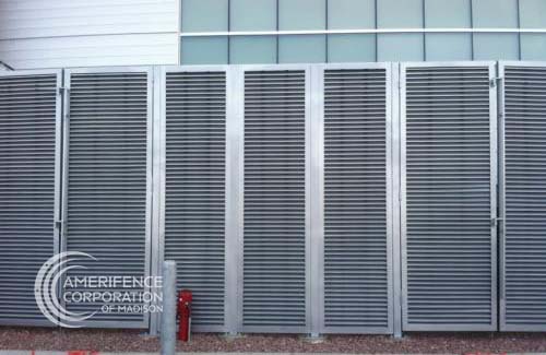 Madison fence company commercial fence contractors Wisconsin architectural mechanical screening screen louvered semi private private solid staggered board on board shadow box alternating ametco barnett and bates industrial louvers rooftop louvers beta orsogrill omega chillers generators truck wells outside storage condensors rooftop equipment patios trash dumpsters transformers HVAC courtyards pool equipment fence aluminum galvanized steel degree of openness direct visibility standalone wall louvers 