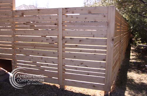 Madison fence contractors residential fence company Madison, Wisconsin wood fencing cedar western red cedar treated pine white red yellow CCA  ACQ2 incense fir 2x4 1x6 2" x 4"  1" x 6"  nails stain solid privacy picket scalloped board on board shadow box pickets rails posts installation panels post caps modern horizontal backyard front yard ranch gate garden diy split rail house lattice old rustic vertical metal post picket dog ear contemporary custom